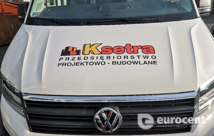 Bus budowlany Ksetra oklejony folią przez Eurocent Opole
